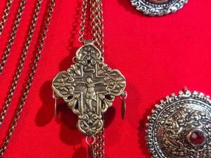 Cast cross with pendants